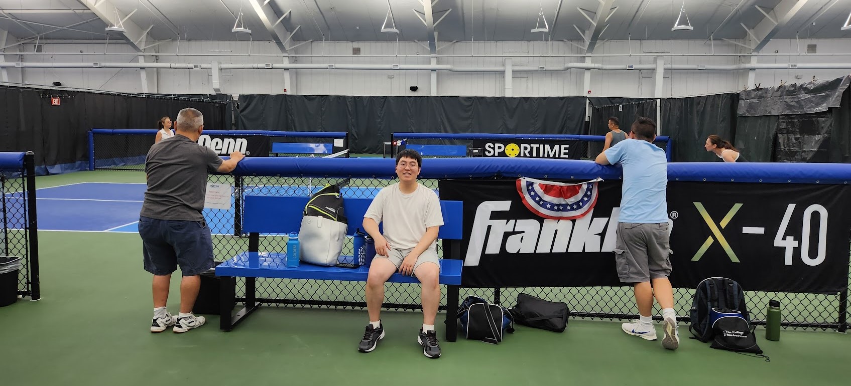 Ryan at a pickleball court with people